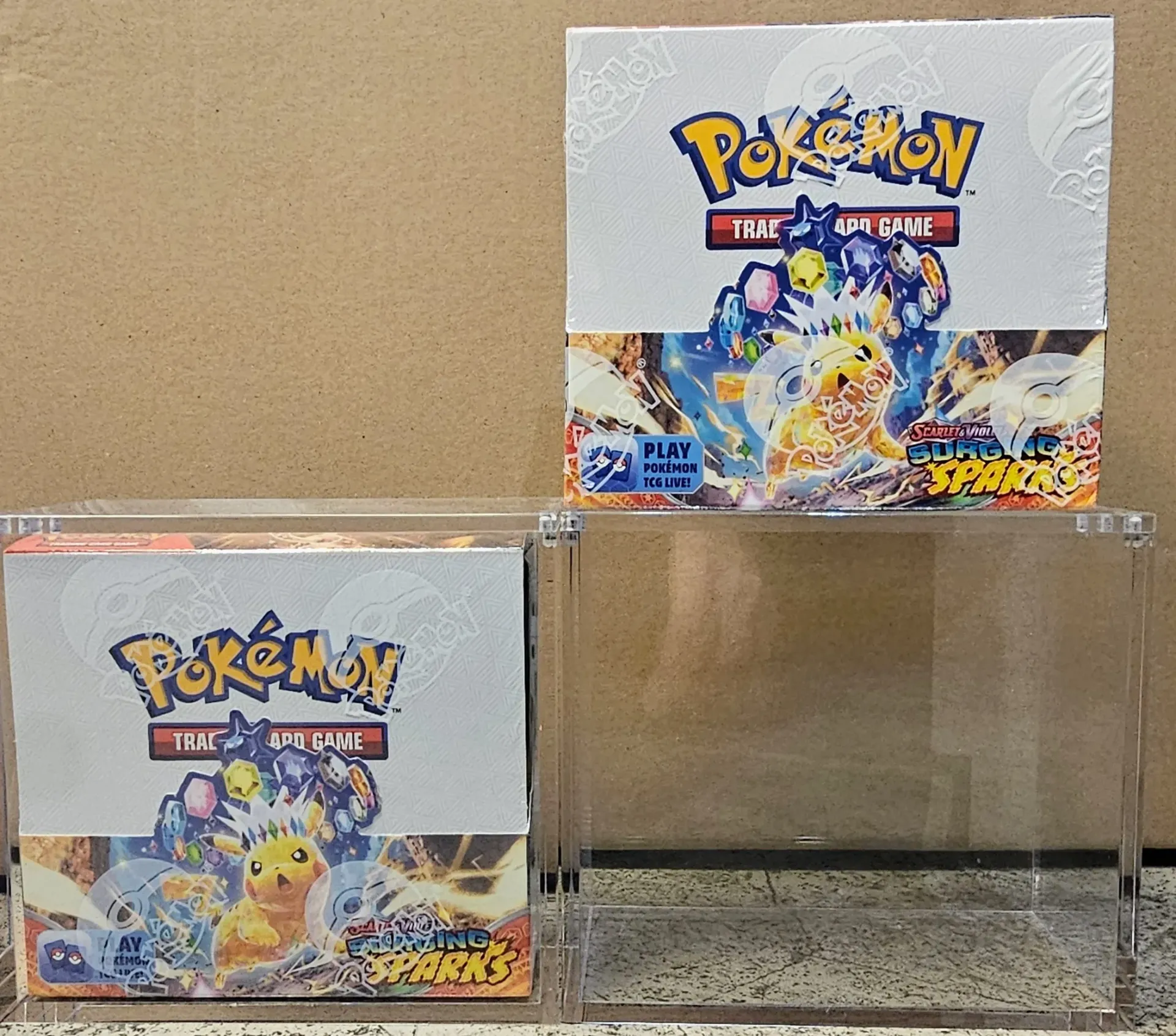 Pokemon Surging Sparks Booster Box (36 Packs - UK) - New & Sealed ** INCLUSIVE 1x Acryl Protection BOX**